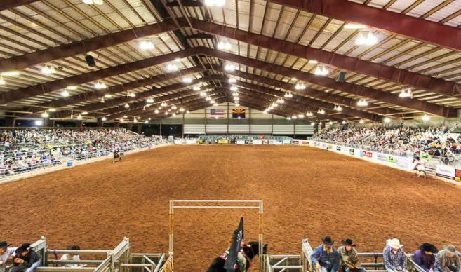Packed indoor rodeo arena in Arizona